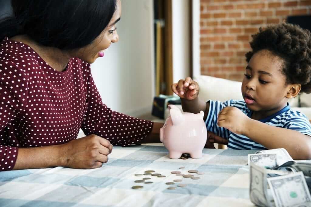 Today, money is digital, so money lessons for children are different. Here’s how to teach money lessons at every age.