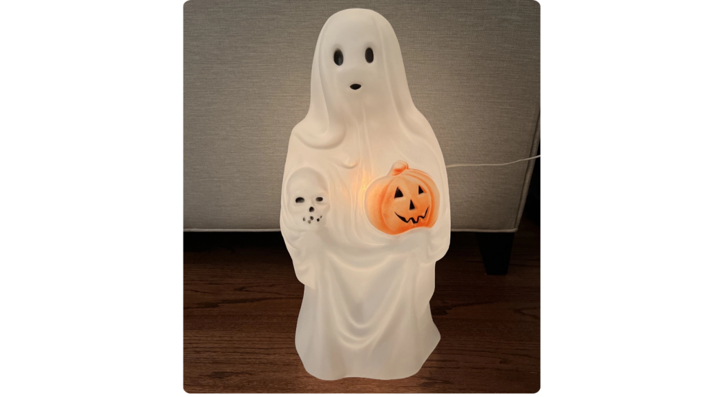 Empire ghost with pumpkin and skull