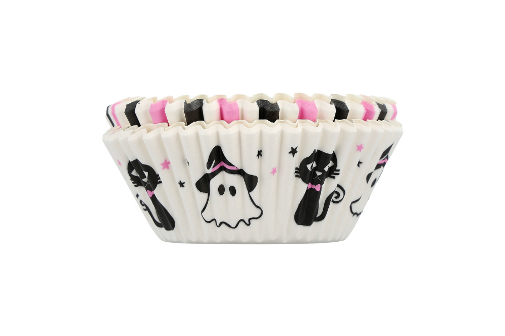 White cupcake liners printed with ghosts, black cats and pink accents