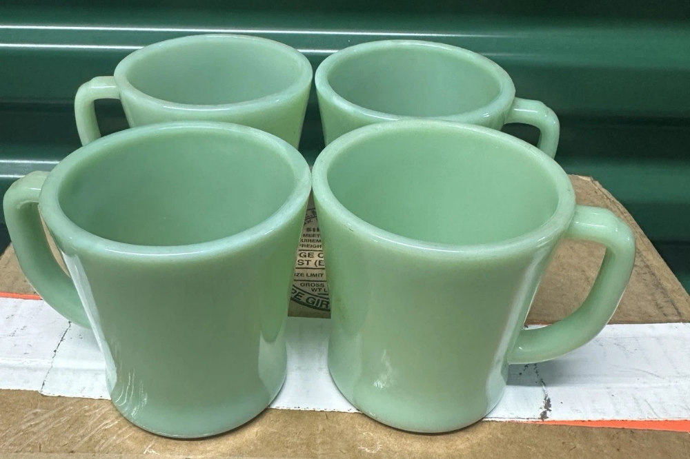 Four Fire-King jadeite D-handle diner mugs