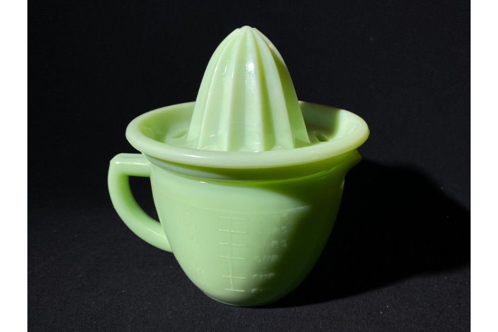Jeannette jadeite measuring pitcher with separate citrus reamer fitted on top