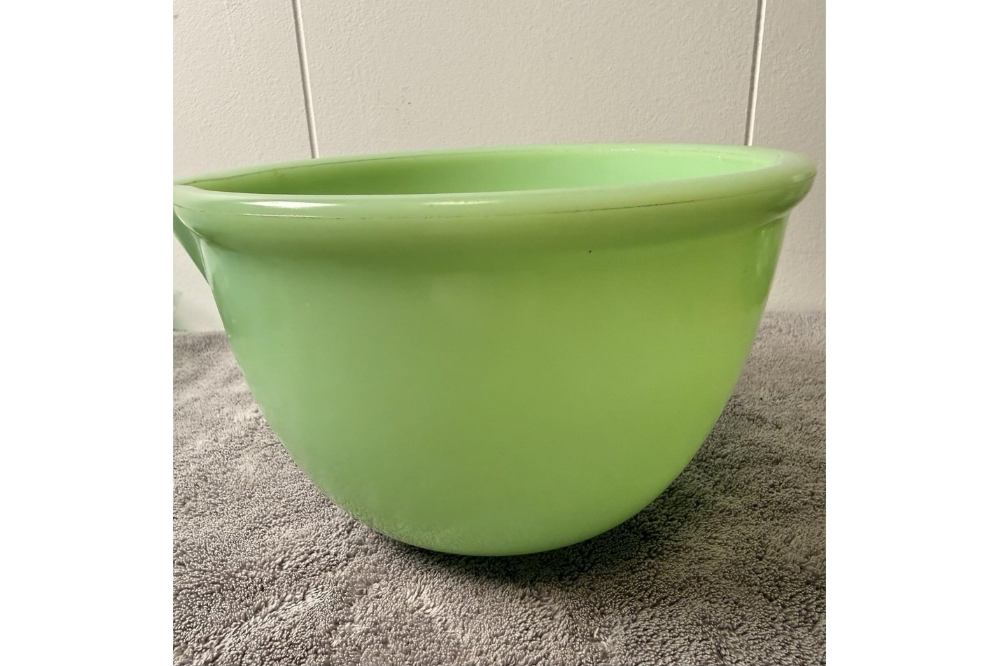 Unmarked smooth jadeite mixing bowl with a pouring spout