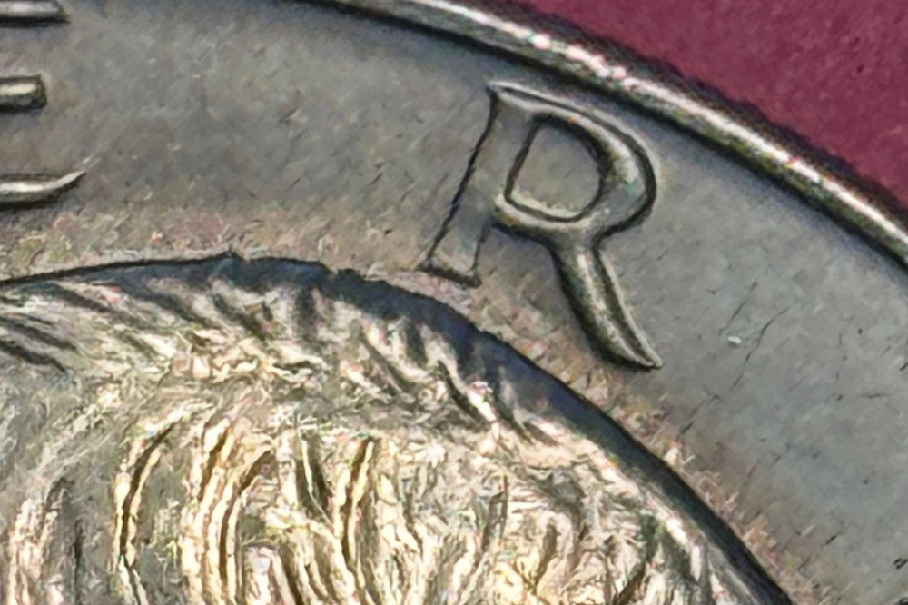 1974-D Peg Leg Eisenhower dollar, R in LIBERTY detail