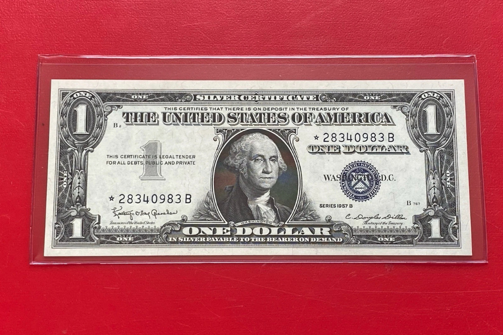 Series 1957B one-dollar Silver Certificate star note with blue seal
