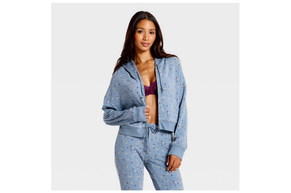 Woman wearing a blue Wild Fable PeachySoft zip hoodie