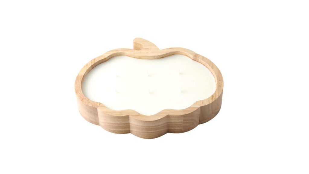 carved wooden candle