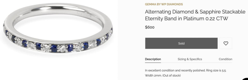 Sapphire unique engagement ring on Gemma.