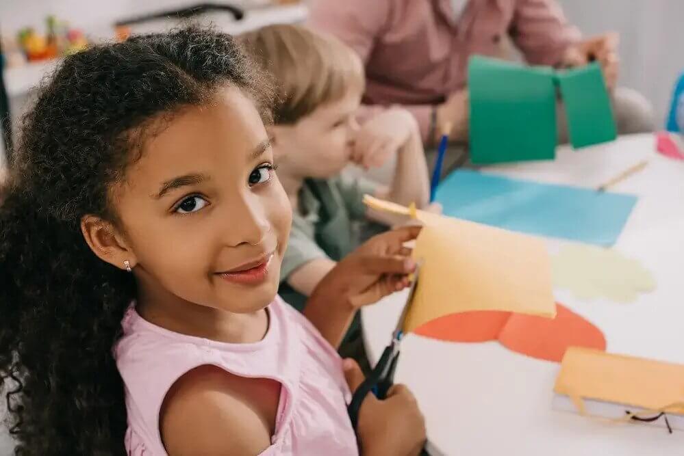 Little girl enjoying free preschool