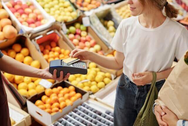 paying grocery bill