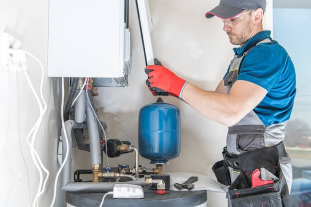 plumber working in a home