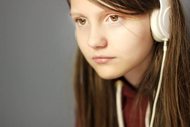 teenager with headphones