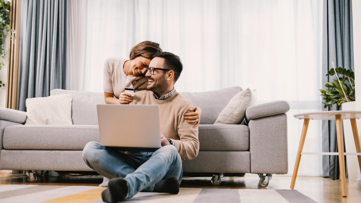 man and woman shopping online making smart money decisions
