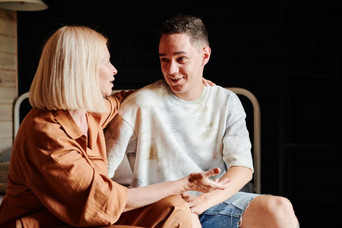 A woman talking to her son.