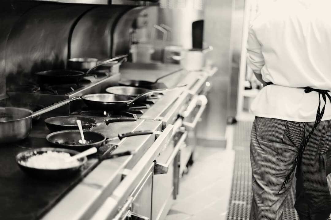 a chef cooking in a kitchen