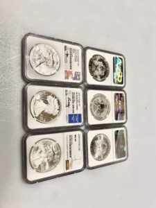 $300 paid for these 6 American Eagle silver coins.