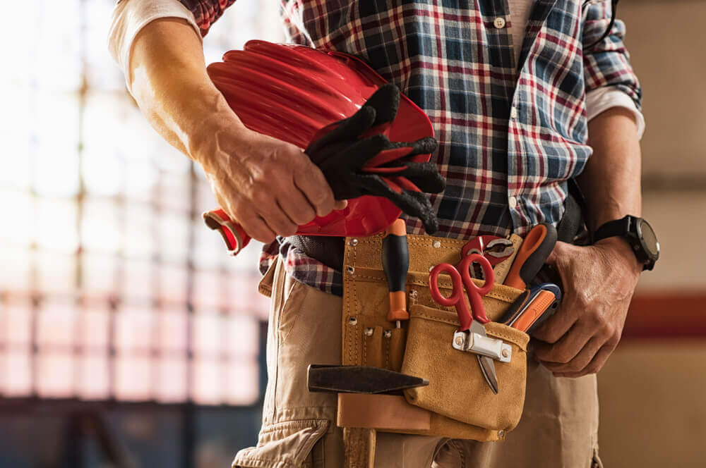 person wearing tool kit
