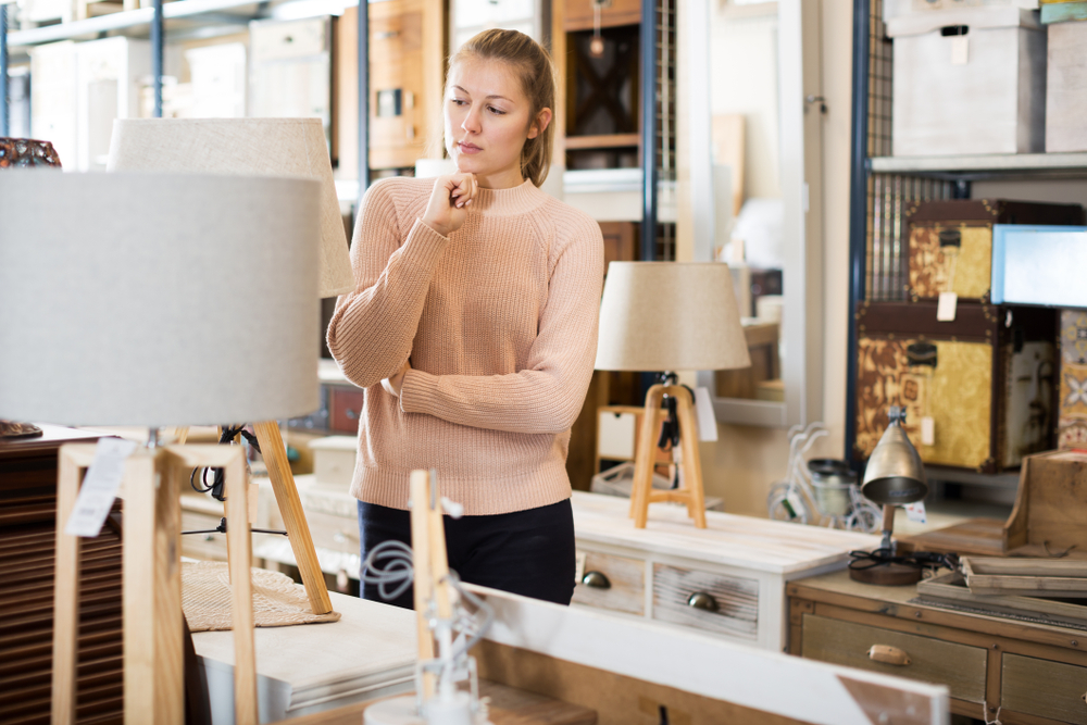 looking at lamps in thrift store