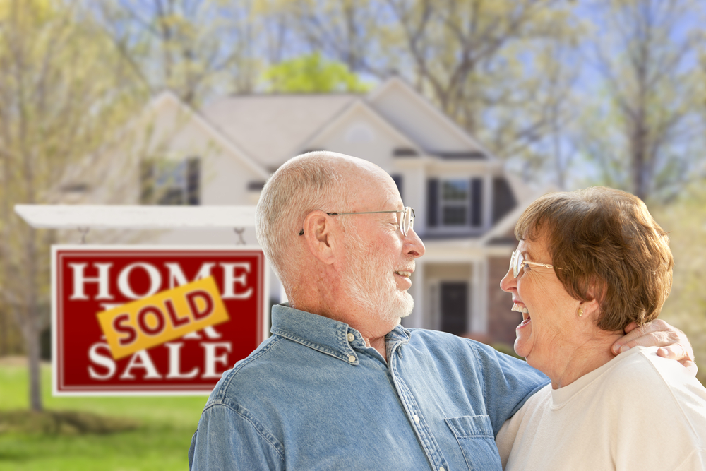 older couple happy to have sold house