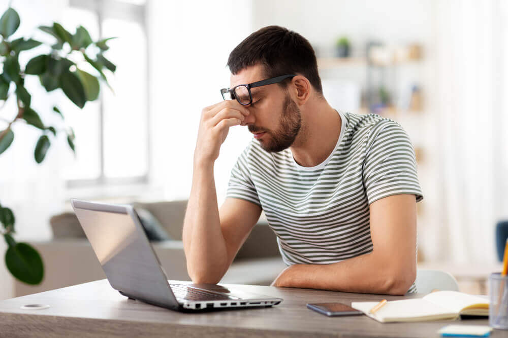 man at dull and boring job