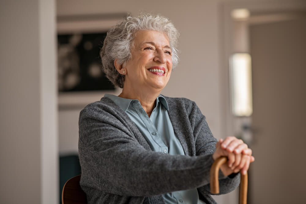 retired woman happy in her home