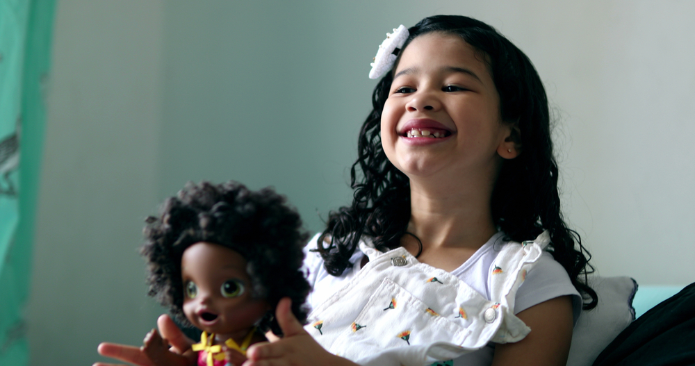 playing with a doll