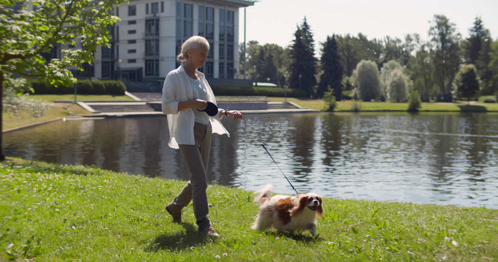 woman walking dog
