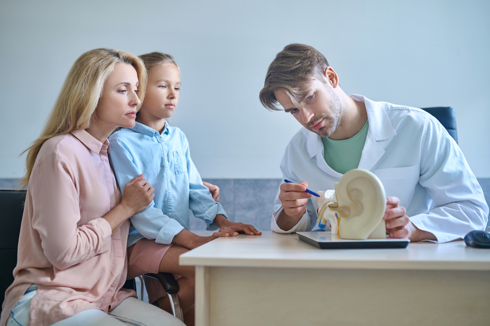 Audiologist explaining about the ear