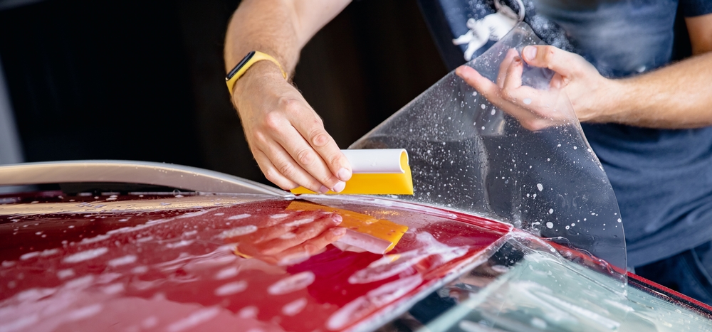 Paint protection film and tint installer