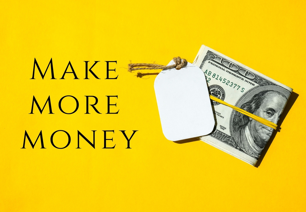 make more money written on card
