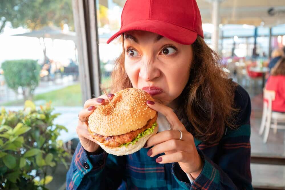 sniffing food at fast food restaurant