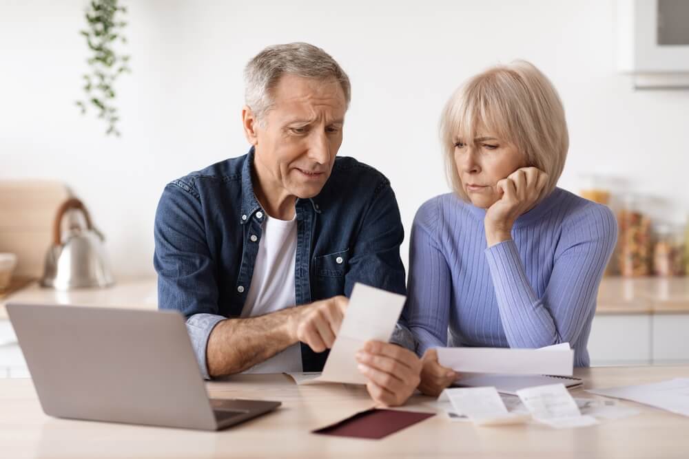 senior couple worried about bills
