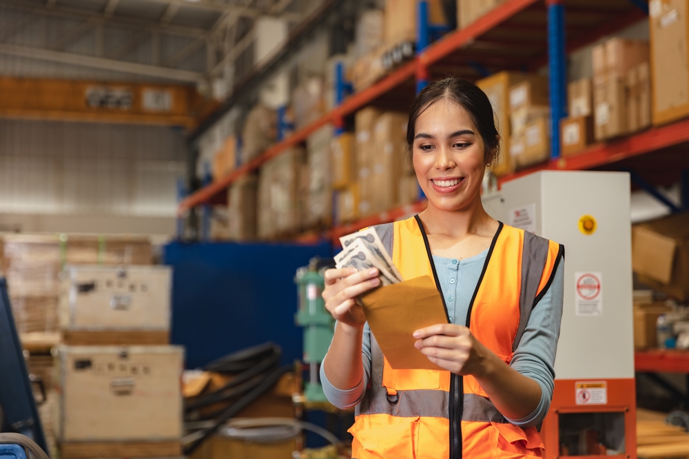 worker getting overtime pay