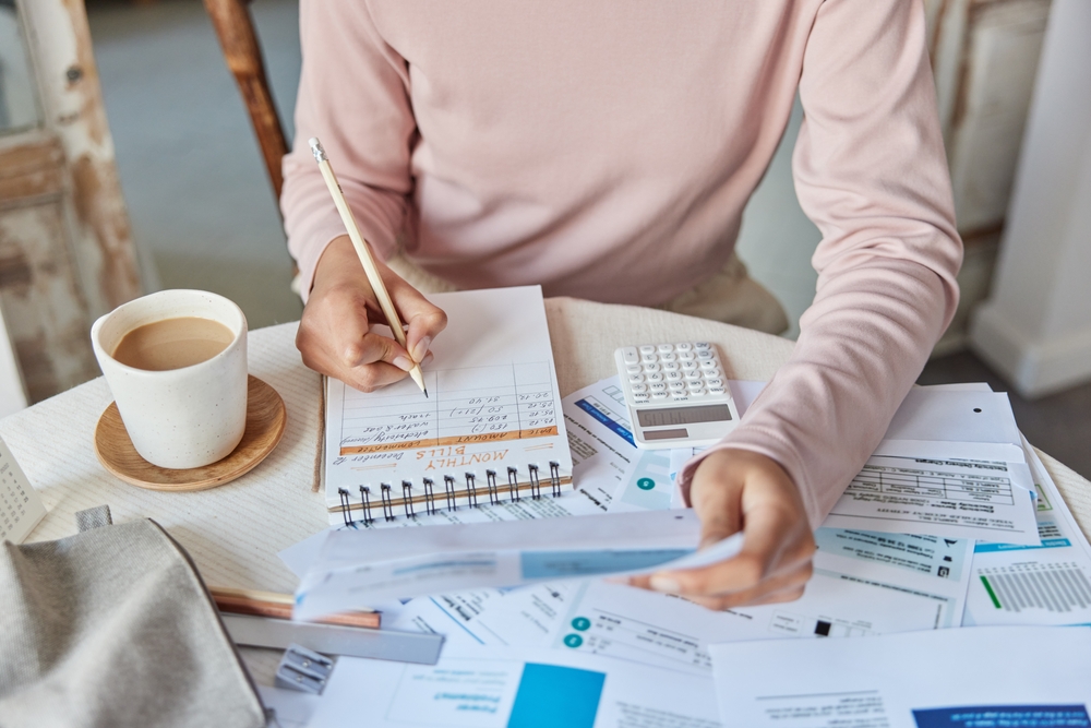woman paying off her debt