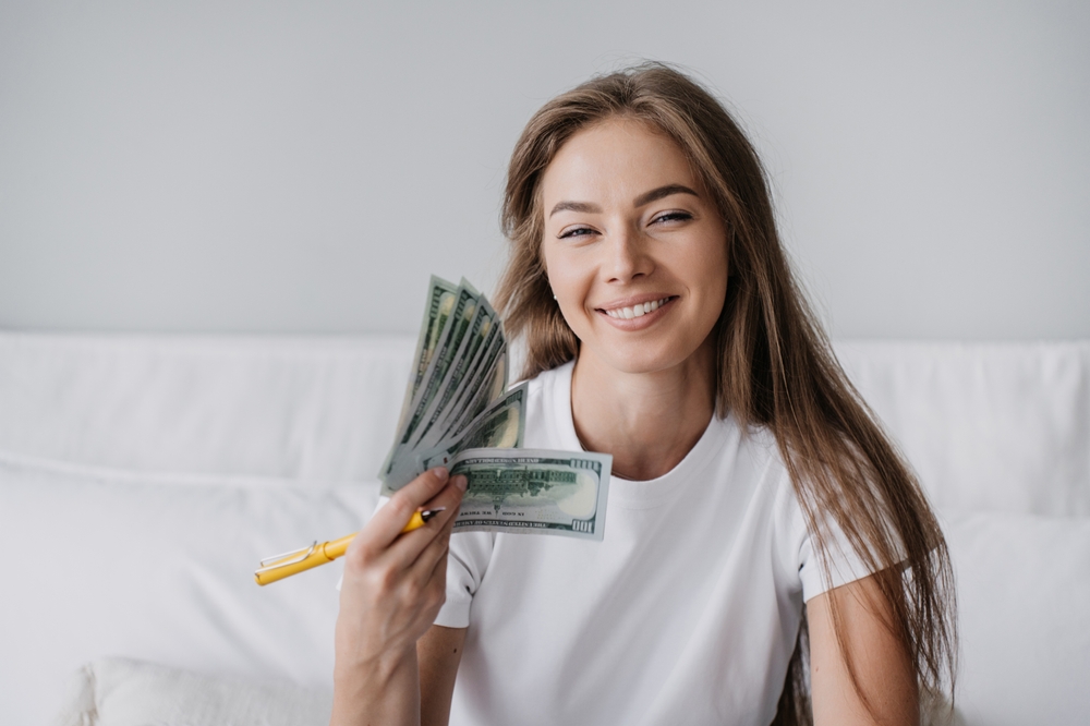 happy woman saved money