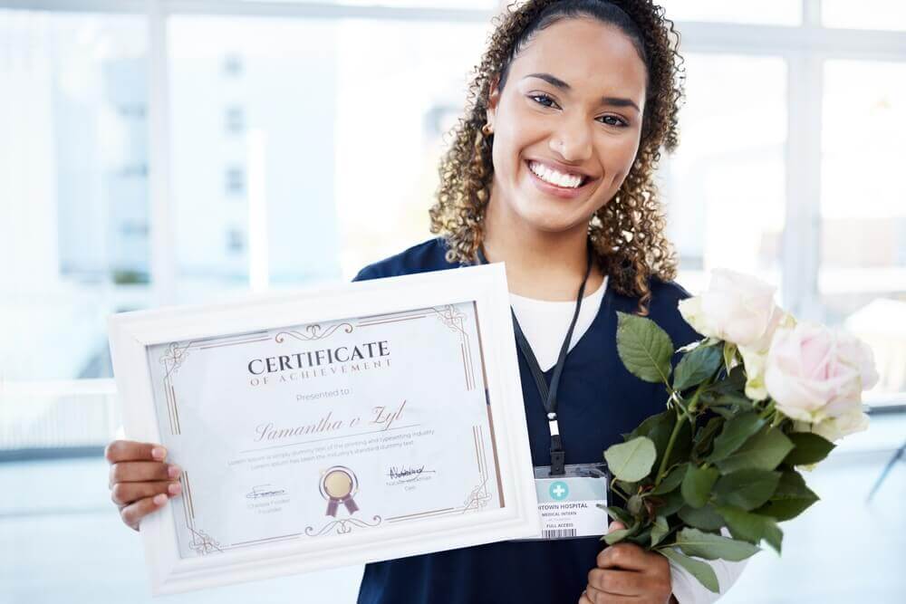 woman with a certificate earned online