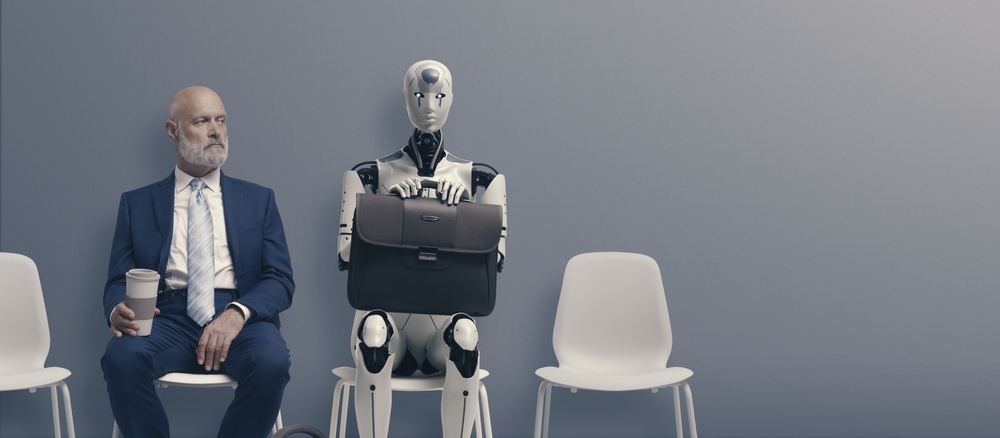 man and ai robot in job interview