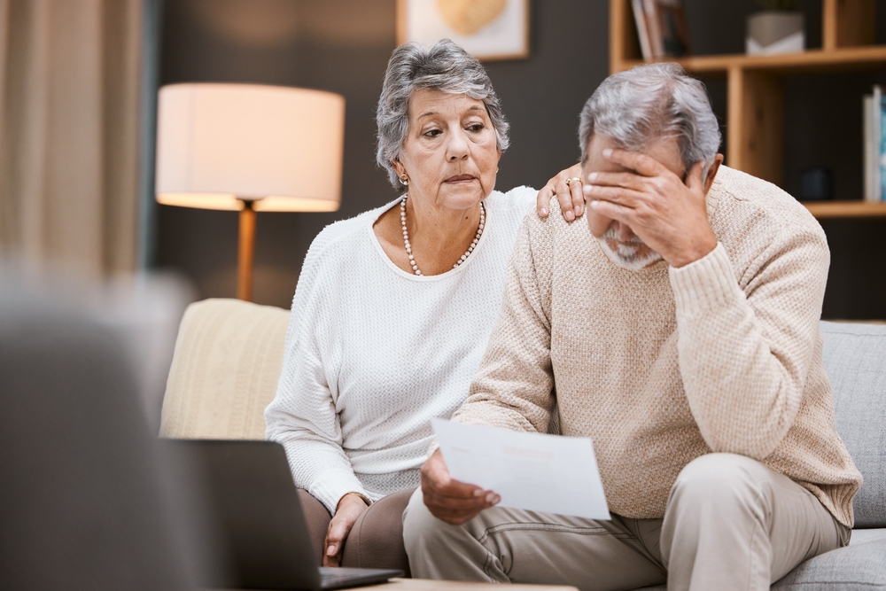 couple worried about scam letter