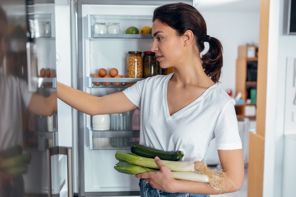 making meal from leftover food in fridge