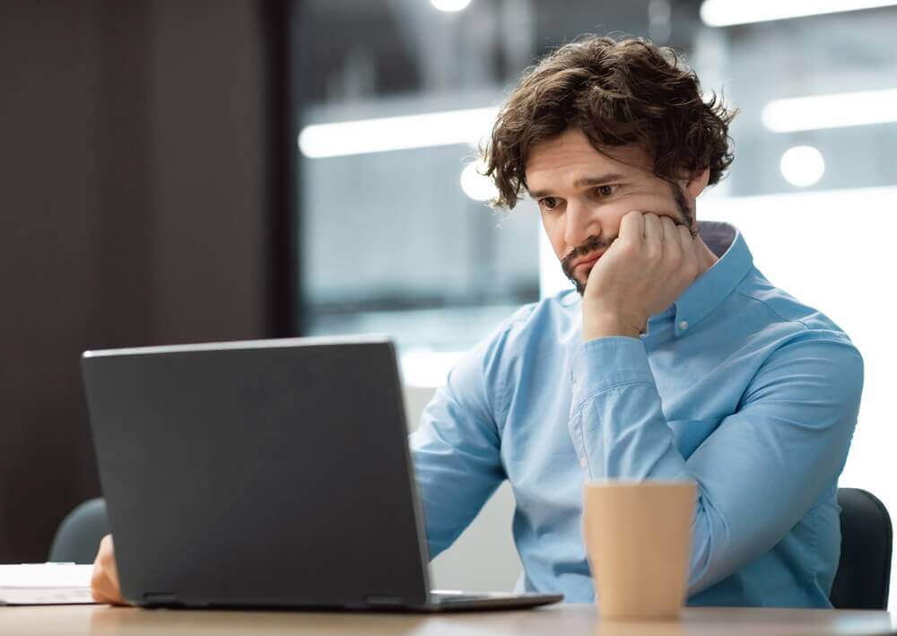 man in a boring office job