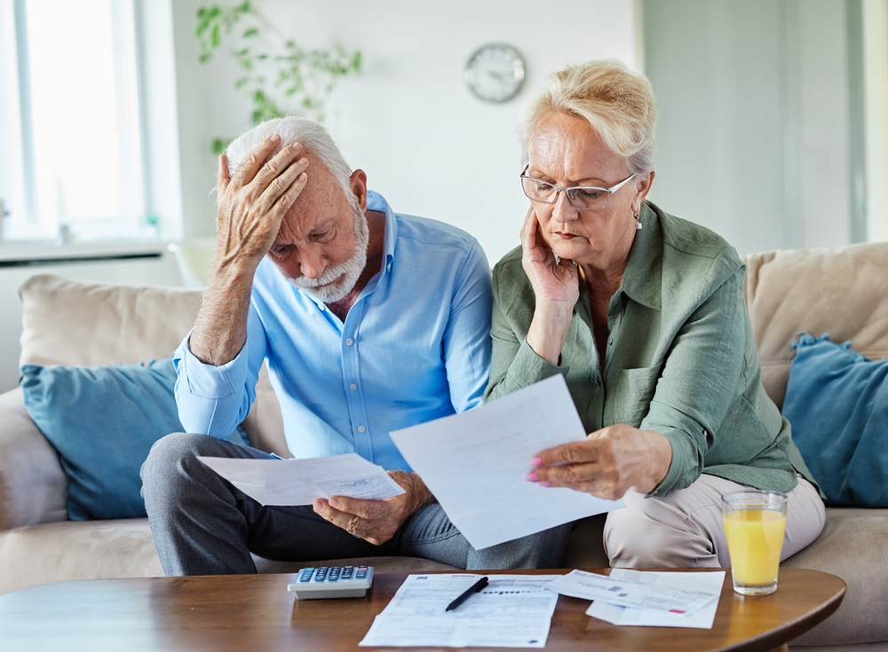 older couple worried about money