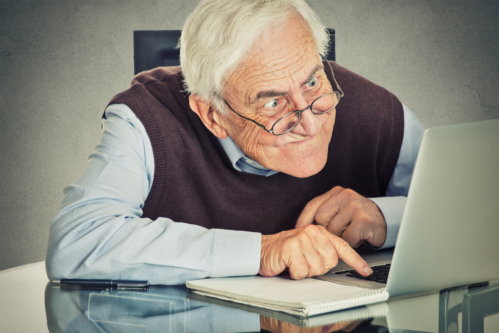 old person confused by computer