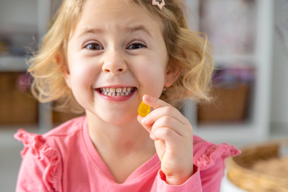 child eating candy