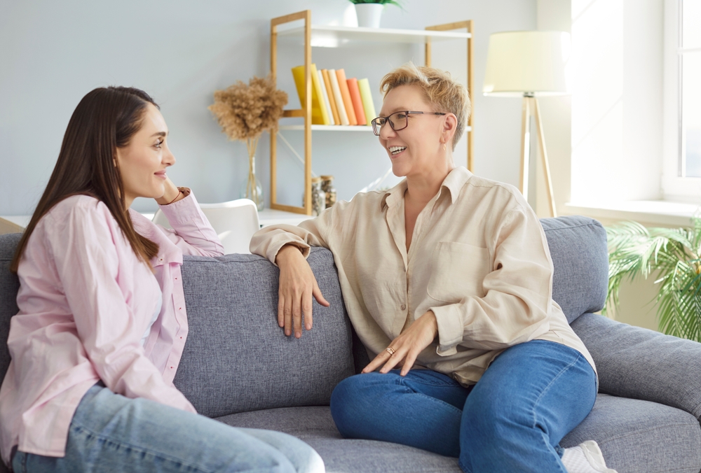 older mother and daughter talking
