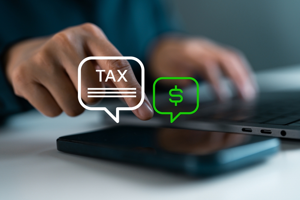 tax sign and a calculator