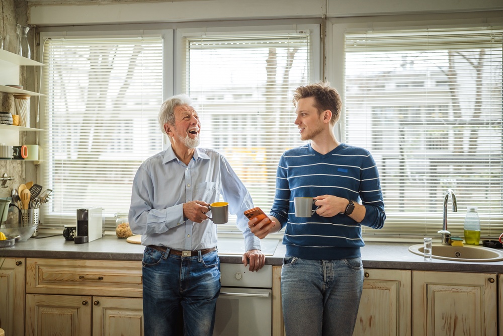 father and adult son talking