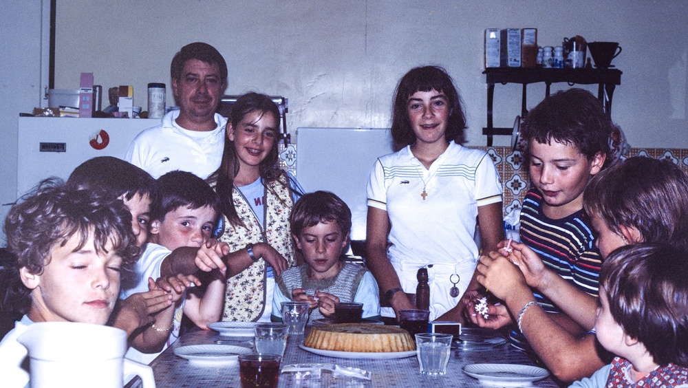 family in 1980s kitchen