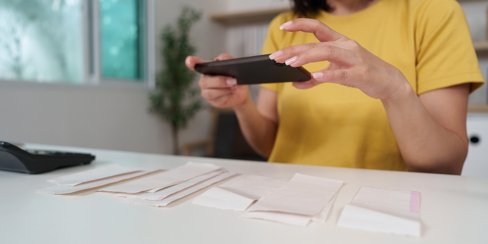 woman scanning receipts