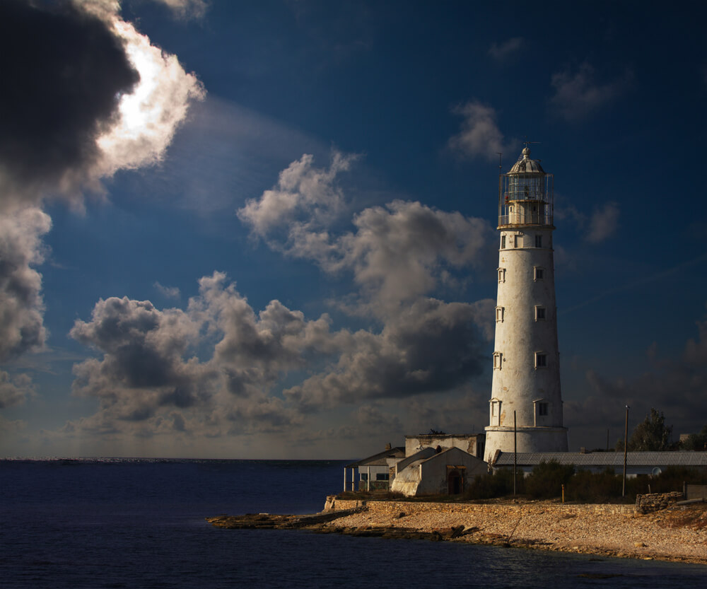 Lighthouse,At,Night