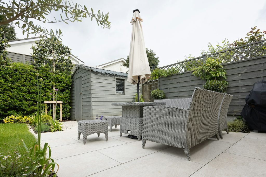 Discover affordable ways to choose materials, arrange furniture, and create a welcoming outdoor space.