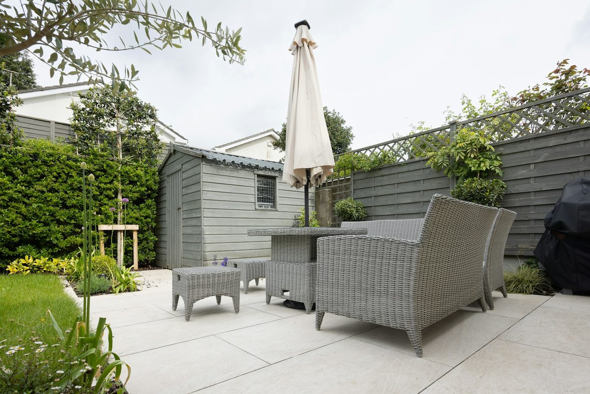 Discover affordable ways to choose materials, arrange furniture, and create a welcoming outdoor space.